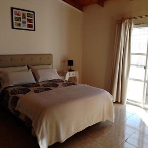 Casa tipo duplex con patio y parrilla. Muy cómoda